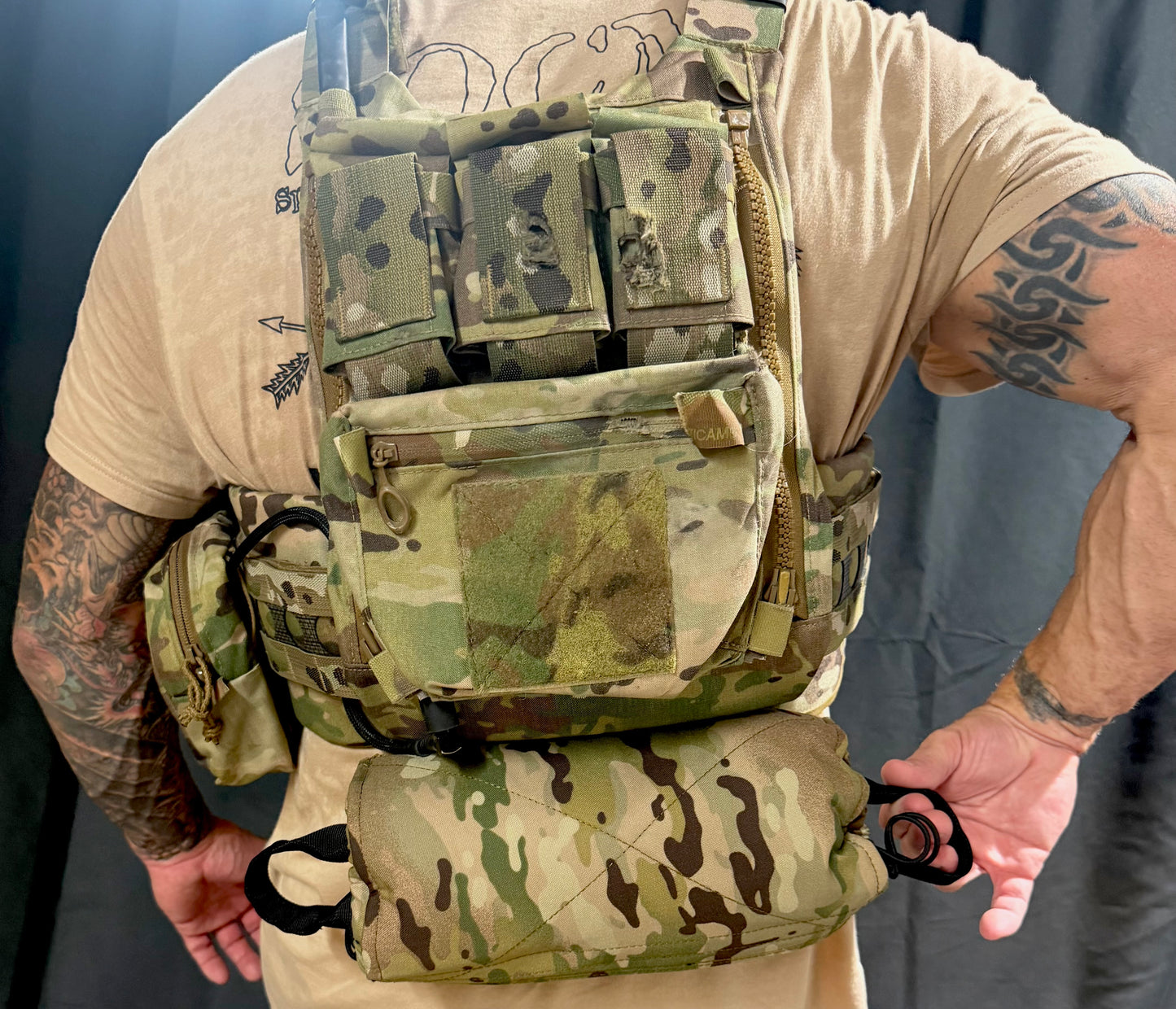Lite Fighter Poleless Litter rolled into its compact storage roll with MOLLE and plate-hanger provisions, approx 12 x 5 in
