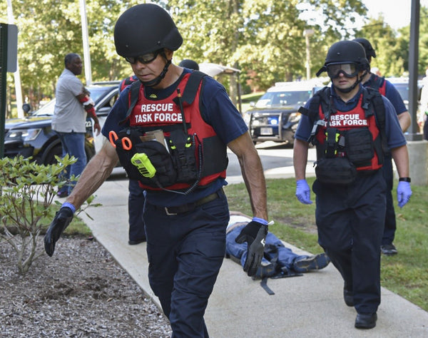 Tactical team canine extraction and rapid drag litter transport